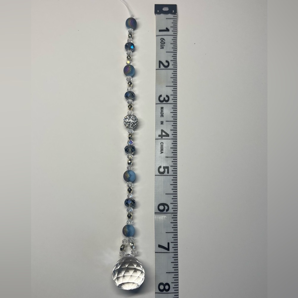 Mini suncatcher, blue, clear with silver accents.